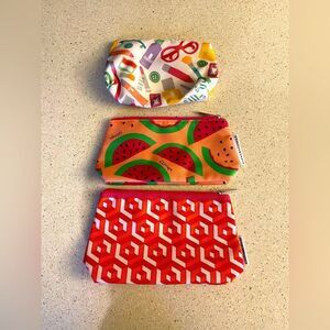 3 Women’s Clinique make up pouches
